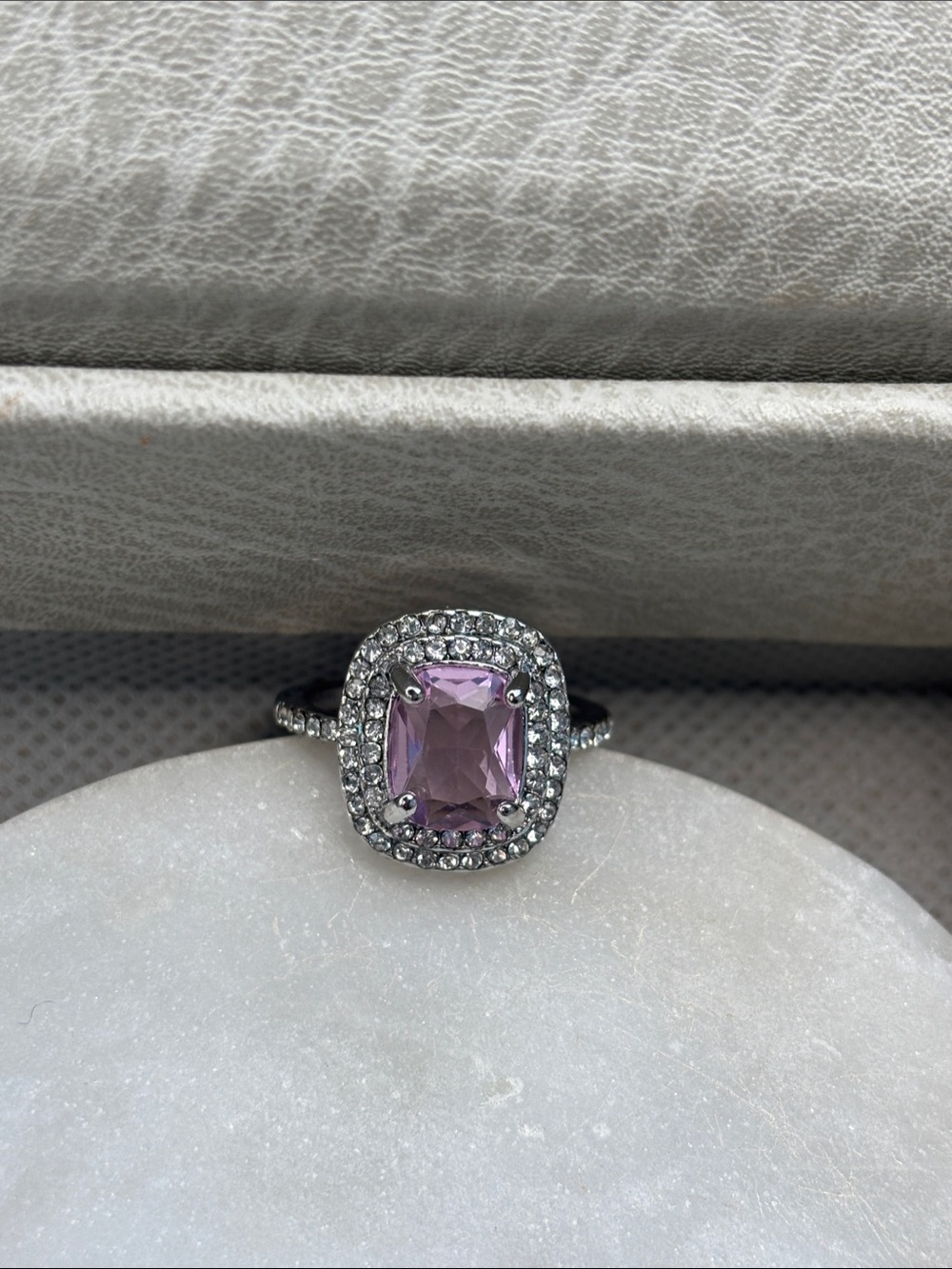 Silver Ring with Purple Cushion-Cut Center Stone and Halo